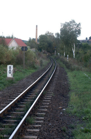 View from the height of the Impregnating factory in the direction of the mentioned level crossing and its warning signal