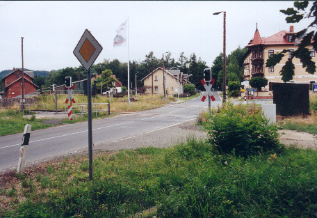 The crossing of the Jonsdorf street near of the Bertsdorf station, in the background the hotel Bertsdorf station